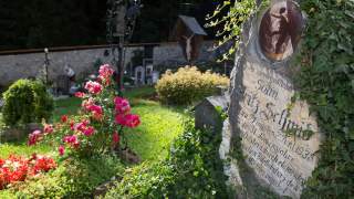 Friedhof in Johnsbach - Auf dem Friedhof von Johnsbach liegen viele bekannte Bergsteiger begraben. Foto: Iris Kürschner