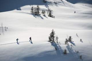 People with ski in snowy landscap