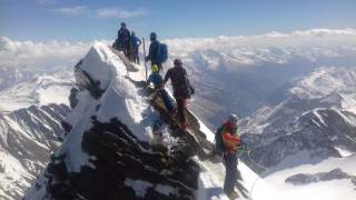 Bergführerin mit Gästen am Grossglockner